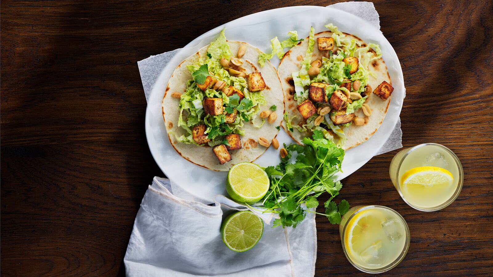 Two tofu tacos on a plate