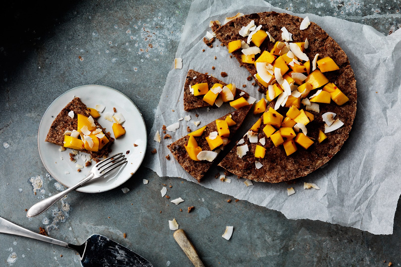 Rawfood Brownie with Mango & Coconut Flakes